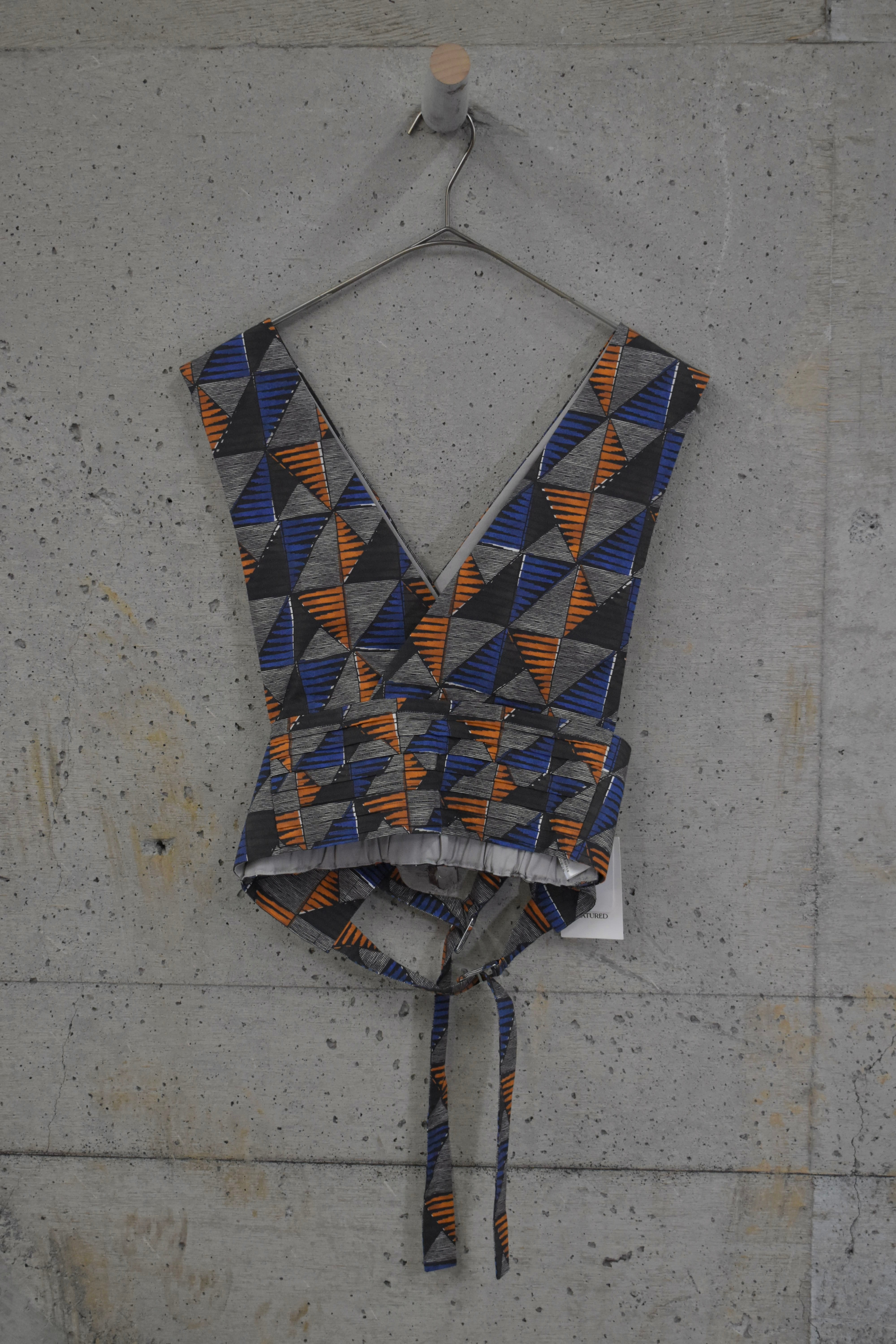 Geometric pattern deep V-neck vest