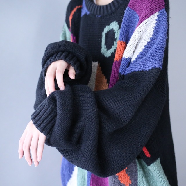 black base colorful art pattern over silhouette knit