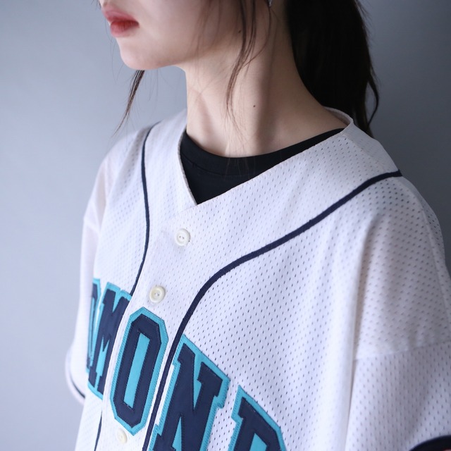 "EDMOND" 18 number over silhouette baseball shirt