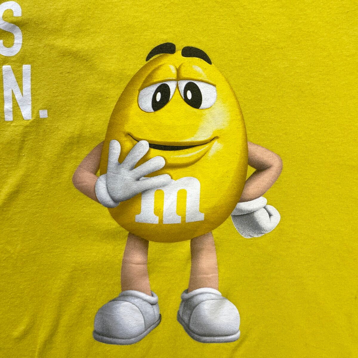 エムアンドエムズ キャラクターＴシャツ サイズ表記 M イエロー m&m's マース YELLOW チョコレート DELTA デルタ 半袖 character プリント キャラT 古着【中古】WV2504-R0249 m&m's エムアンドエムズ キャラクタープリントTシャツ メンズXL 古着