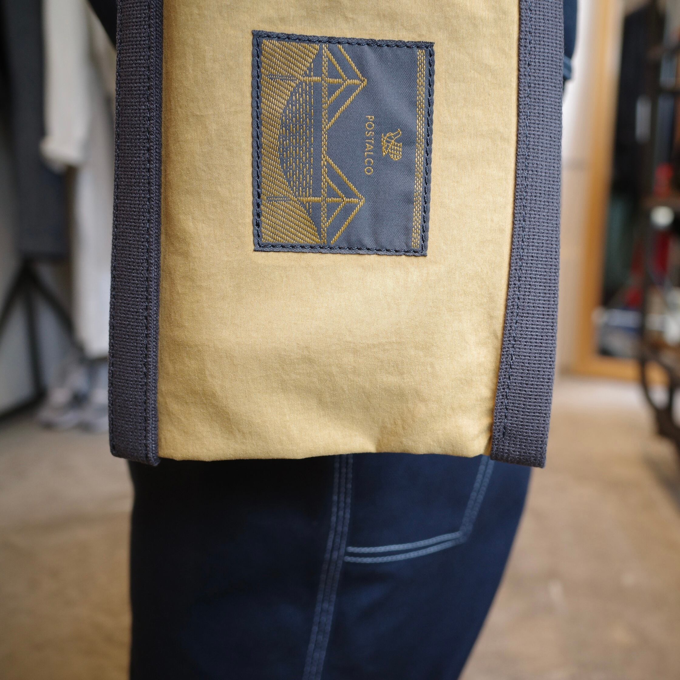 POSTALCO(ポスタルコ) / UTILITY POUCH -Yellow Ochre- | Signs