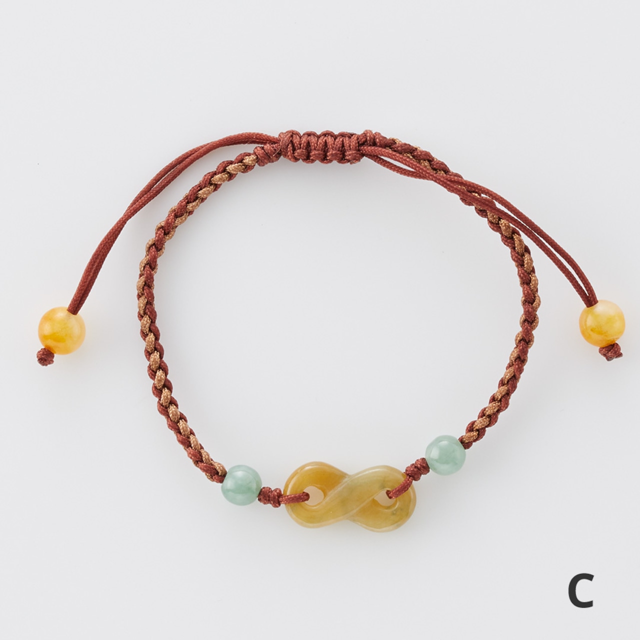 個性的な翡翠がキュート！ カービング紐ブレスレット イエロー A貨翡翠 jd_br1081
