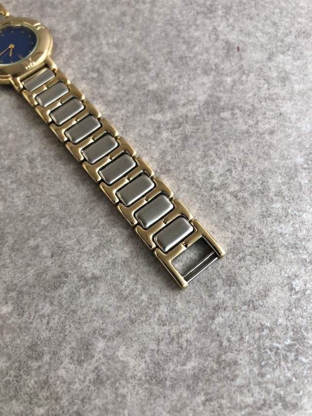 Yves Saint Laurent イヴ・サンローラン 腕時計 シルバー×ゴールド ラウンドロゴ vintage ヴィンテージ オールド 3vtjxx