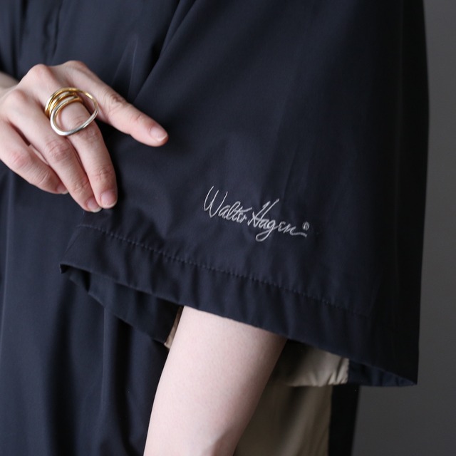 bi-color switching design over silhouette half-zip s/s pullover