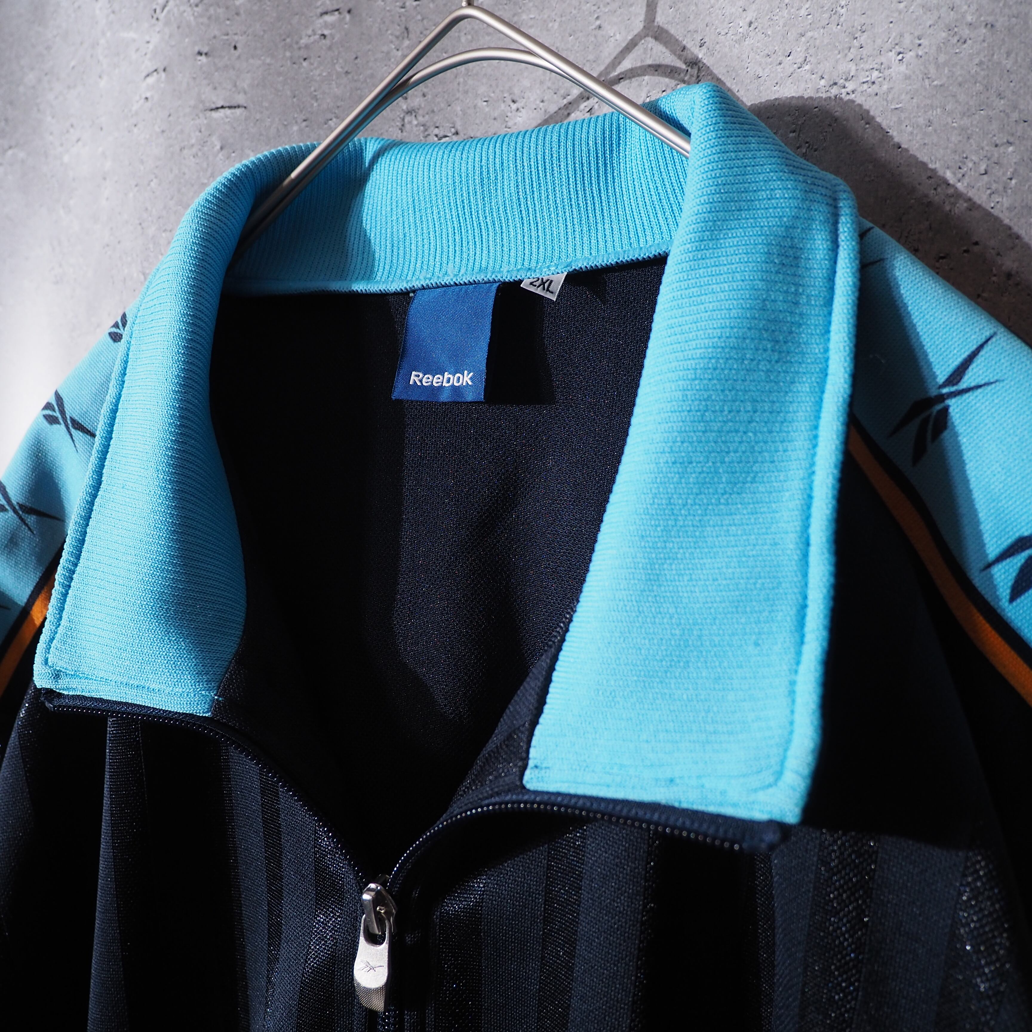 ” Reebok ” Good color line logo printed loose track jacket