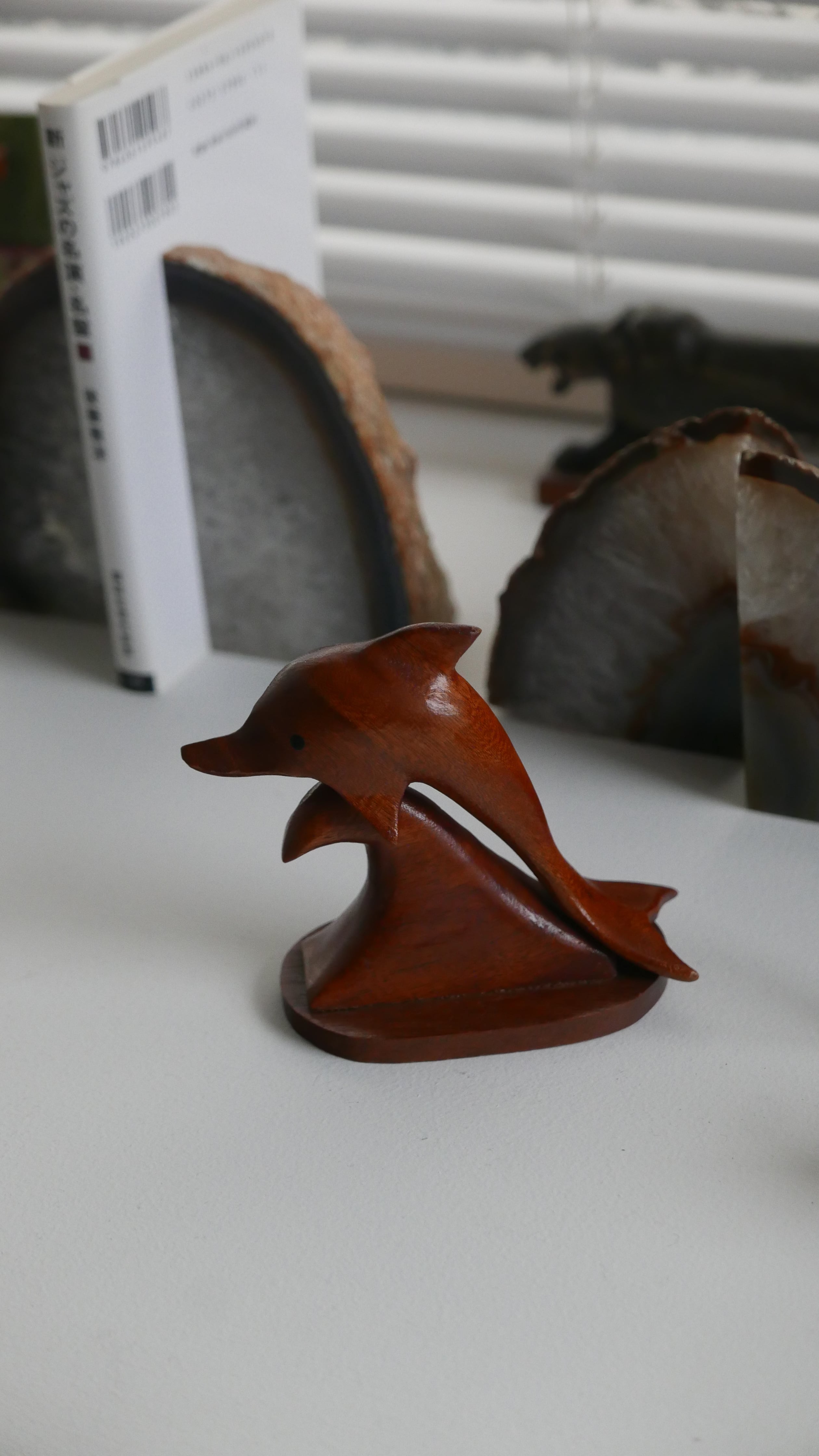 small wooden dolphin