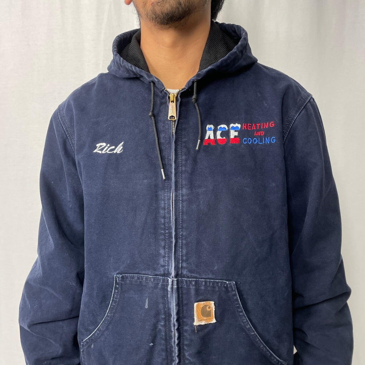 カーハート ヘビーワークジャケット ネイビーカラー 企業ロゴ カーハート ヘビーワークジャケット ネイビーカラー 企業ロゴ Carhartt