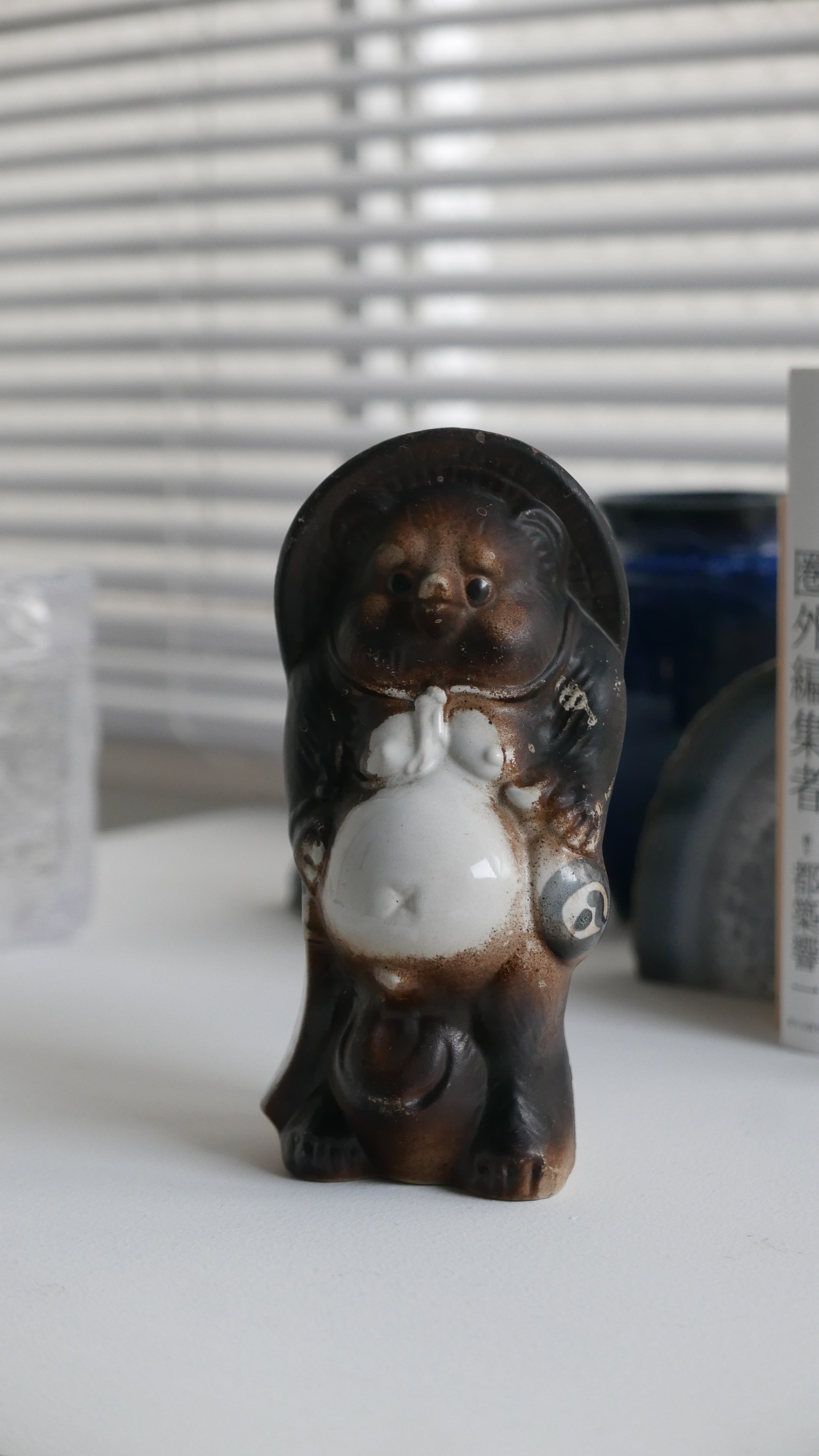 pottery tanuki , powder touch