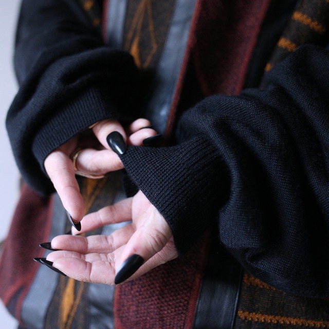 fake leather taping design over silhouette sweater