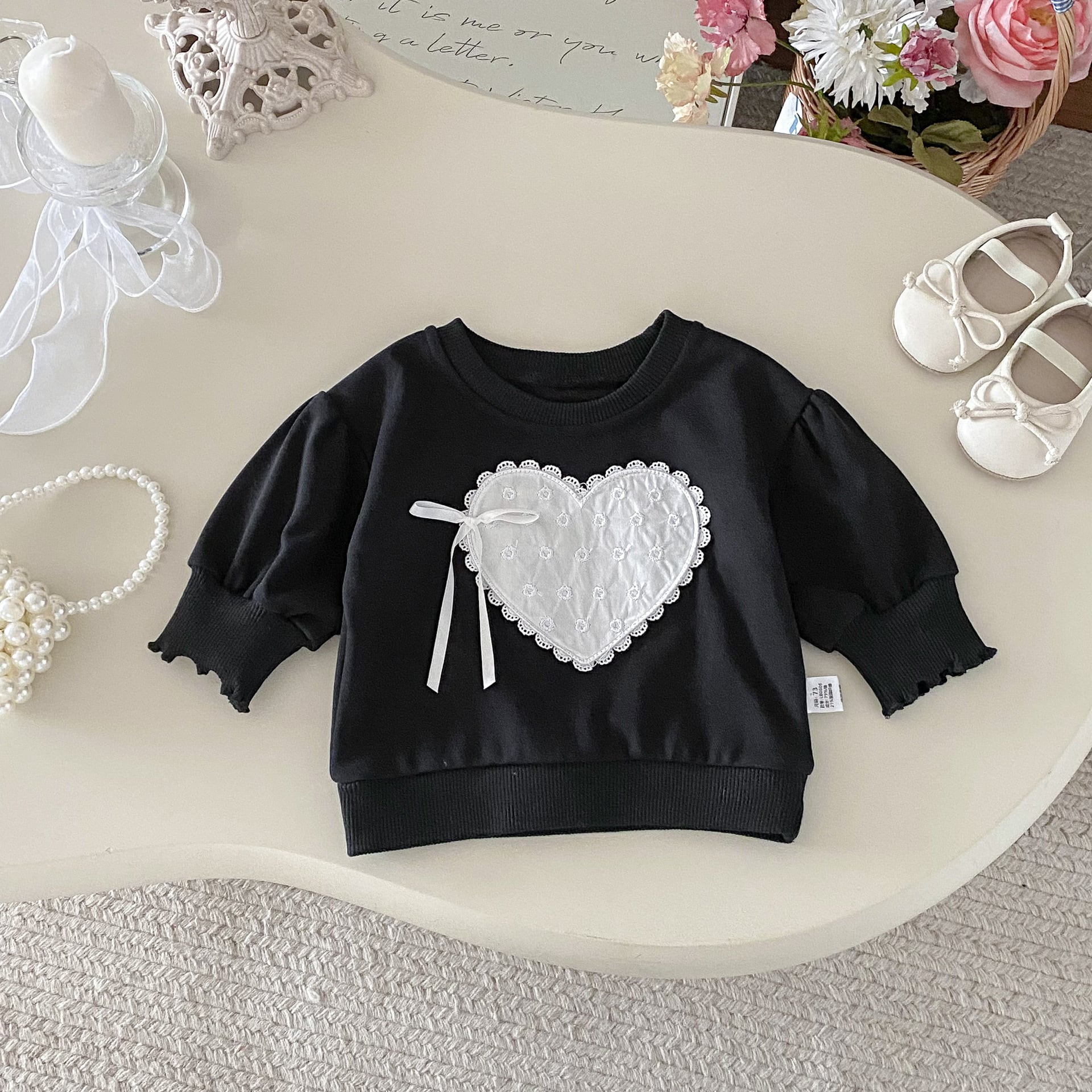 パフスリーブハートリボントレーナー