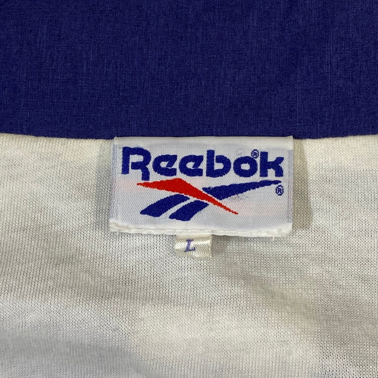 90年代 Reebok リーボック 総柄 ナイロンジャケット メンズL 古着