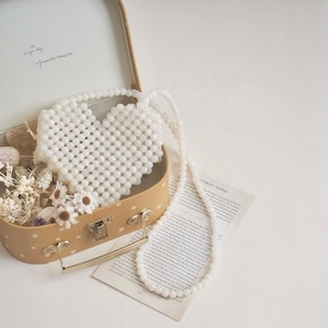 【Limited edition】Shell heart pochette / MILK