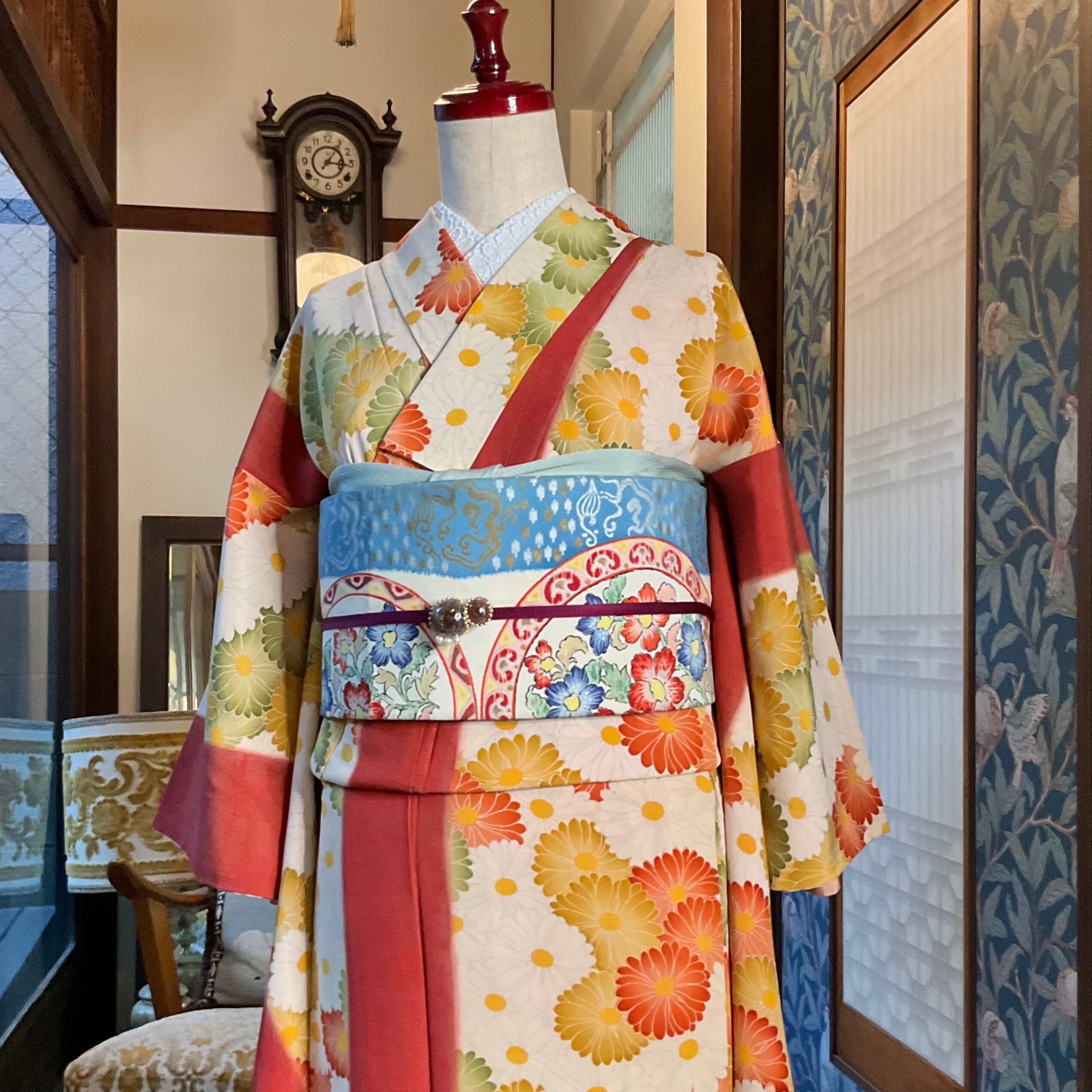 異国の円窓＊水色 花 華 丸紋 紋章 オリエンタル 東洋 刺繍 染め帯