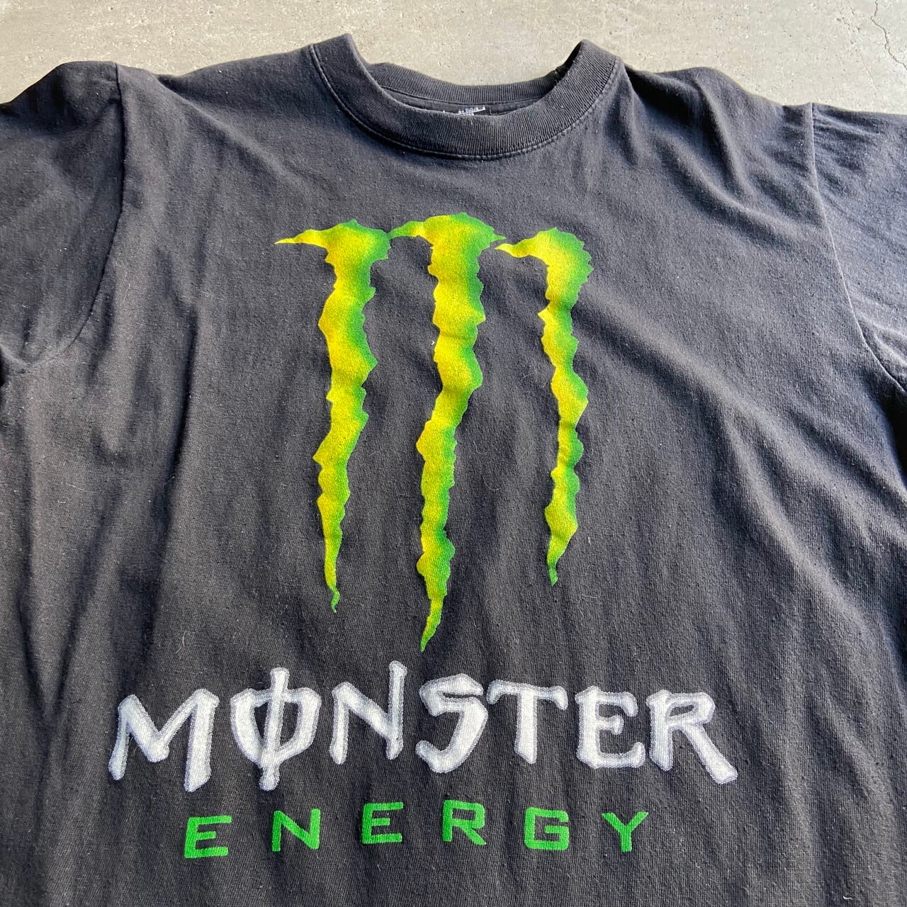 Monster Energy モンスターエナジー フロントロゴ プリント アドバタイジングtシャツ メンズl 古着 ブラック 黒 Tシャツ Ss27 Cave 古着屋 公式 古着通販サイト