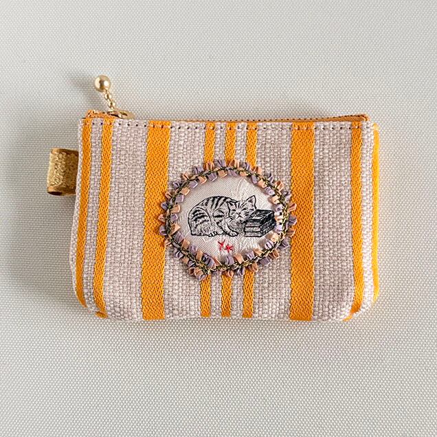 コインパース『すりすり猫・イエロー』