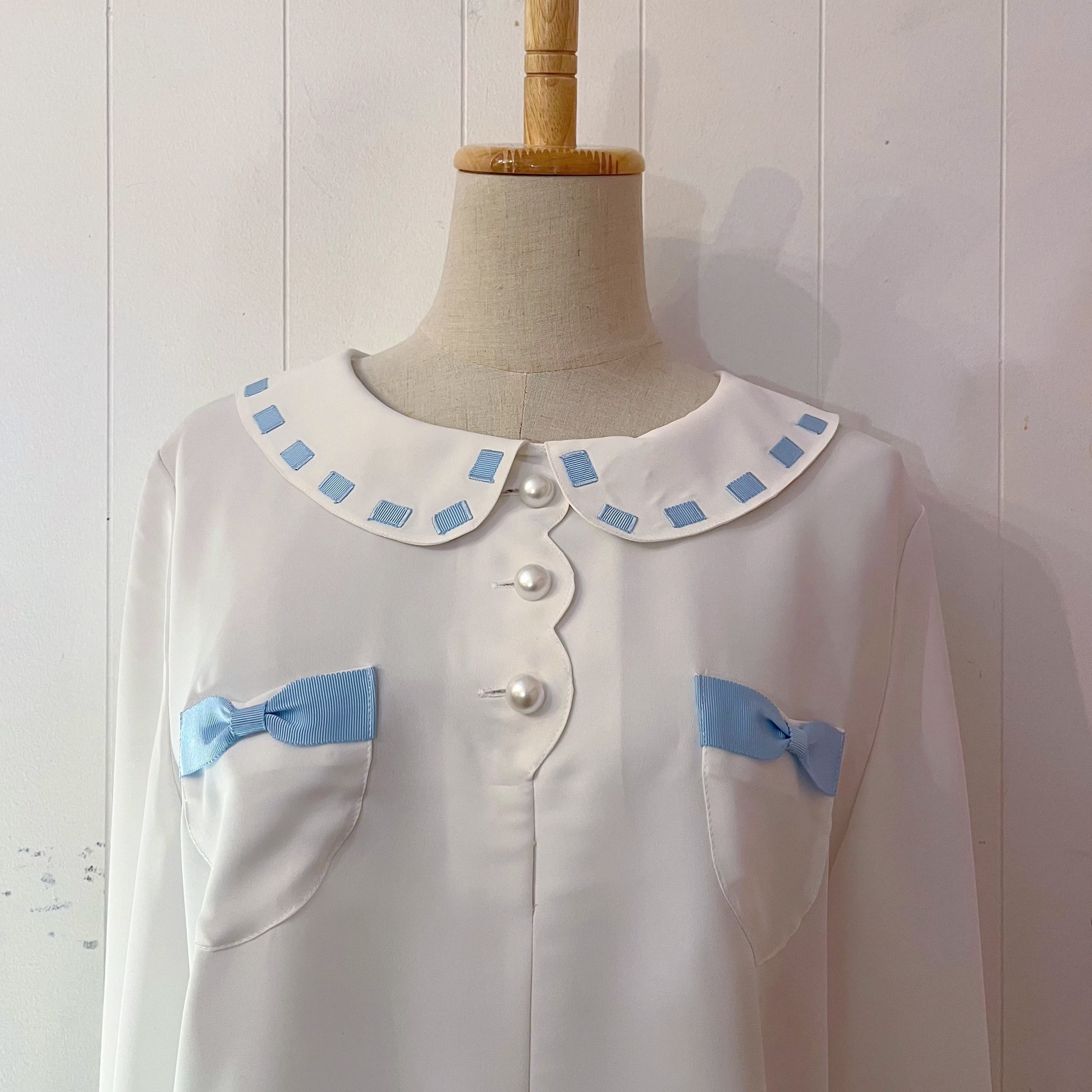 light blue ribbon white blouse