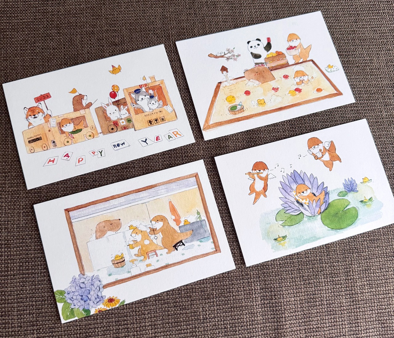 カワウソと友達の季節ポストカードセット１２枚入