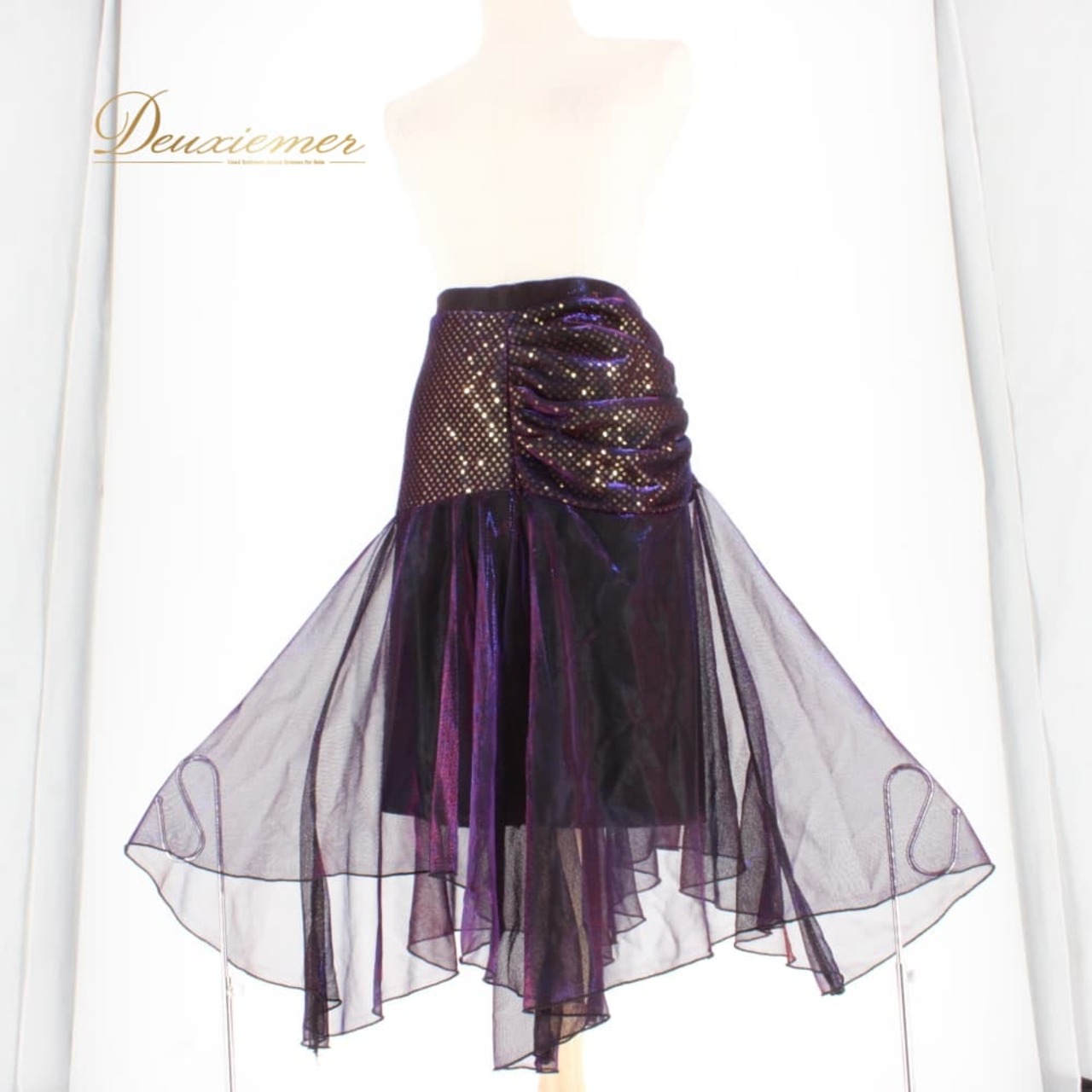 社交ダンス 衣装 スタンダード スカート レッスンウェア ブラック系 レッド系 パープル系 ブルー系 ゴールド系 青 赤 黒 金 紫 練習着 フレアスカート 社交ダンススカート 練習用スカート ダンスレッスン 競技 スタンダード用 スカート単品 タンブラー風 フリル風 裾広がり ひらひら オシャレ きれいめ 派手め 華やか 光沢感 シアー感 メッシュ風 裏地なし風 伸縮性あり ファスナー付き 裾 フリンジ風 カラフルカラー グラデーション風 鮮やか カラー切替 ブルーパープル レッドパープル 紫赤青