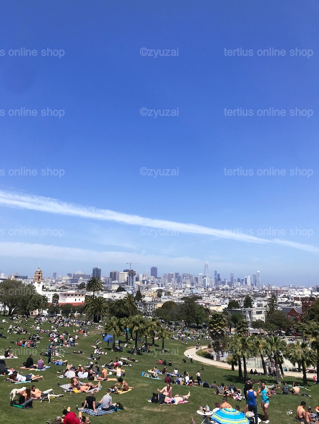 Amidst the freedom and the sun's benevolence, Mission Dolores Park.