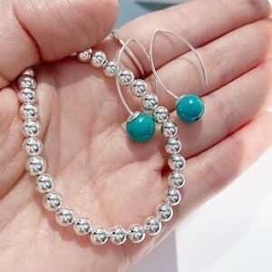 横顔 ビューティー ターコイズ ピアス | Marea(マレア) byリトル