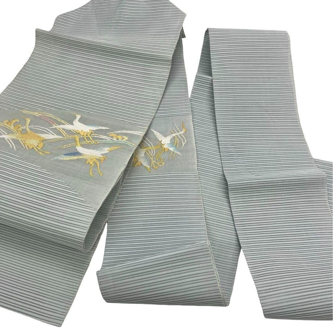 夏帯 名古屋帯 絽綴れ 飛翔鶴模様 金銀糸 薄砧青磁色 O-3666