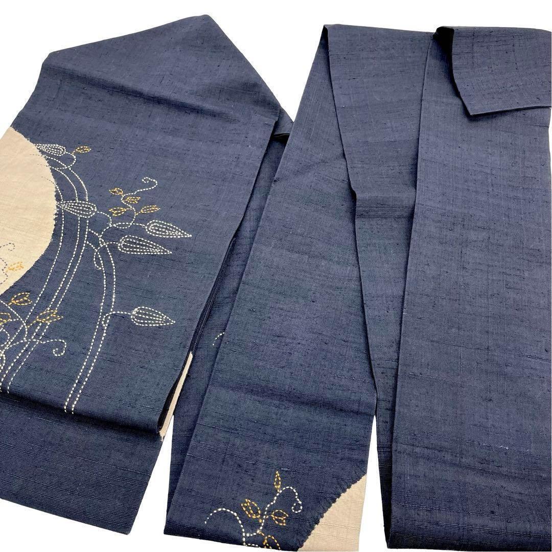 名古屋帯 作家物 刺し子 花草模様 紬 染分け 紺鉄色 O-3659 | リユース  