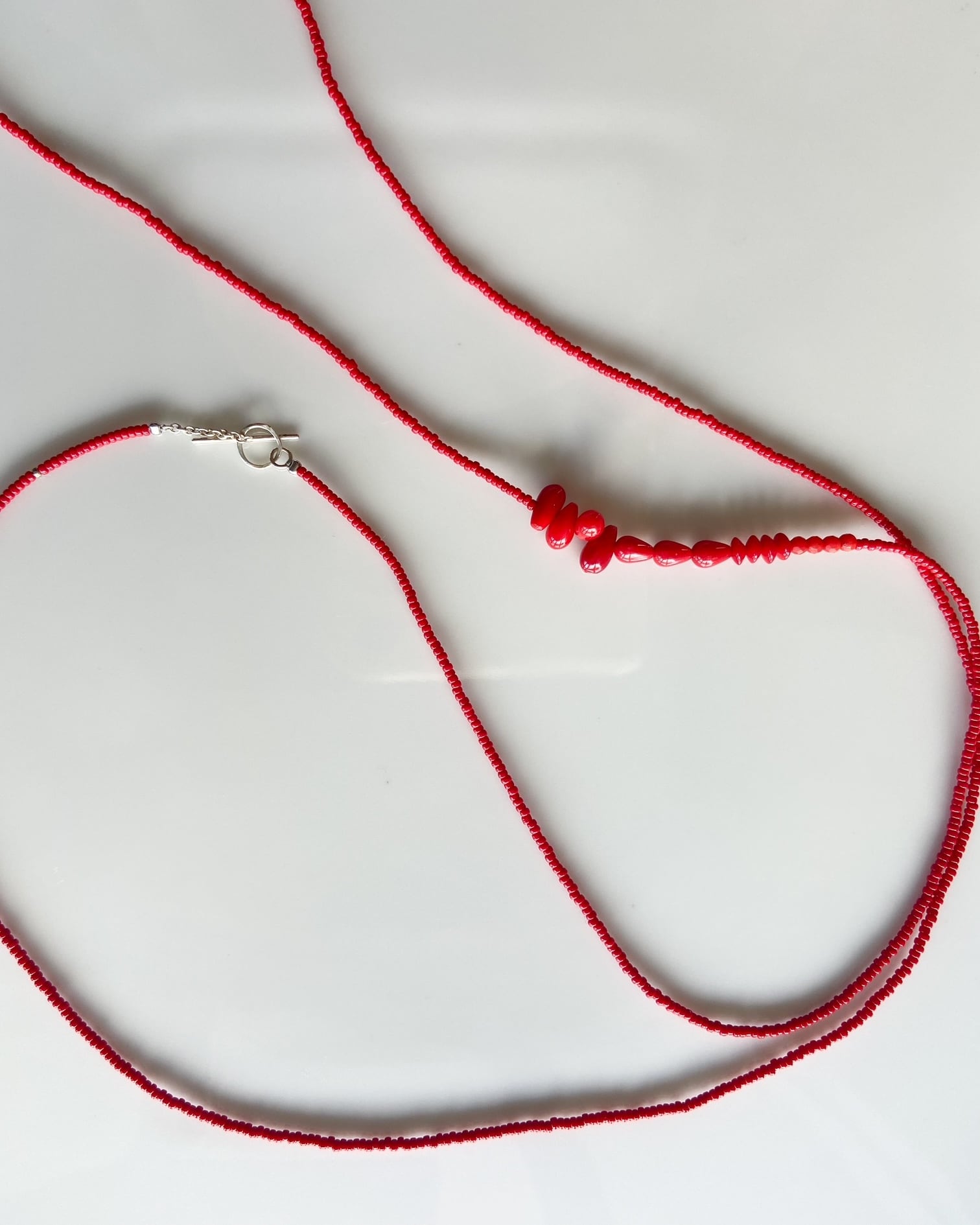 art jewelry marble サンゴロングネックレス