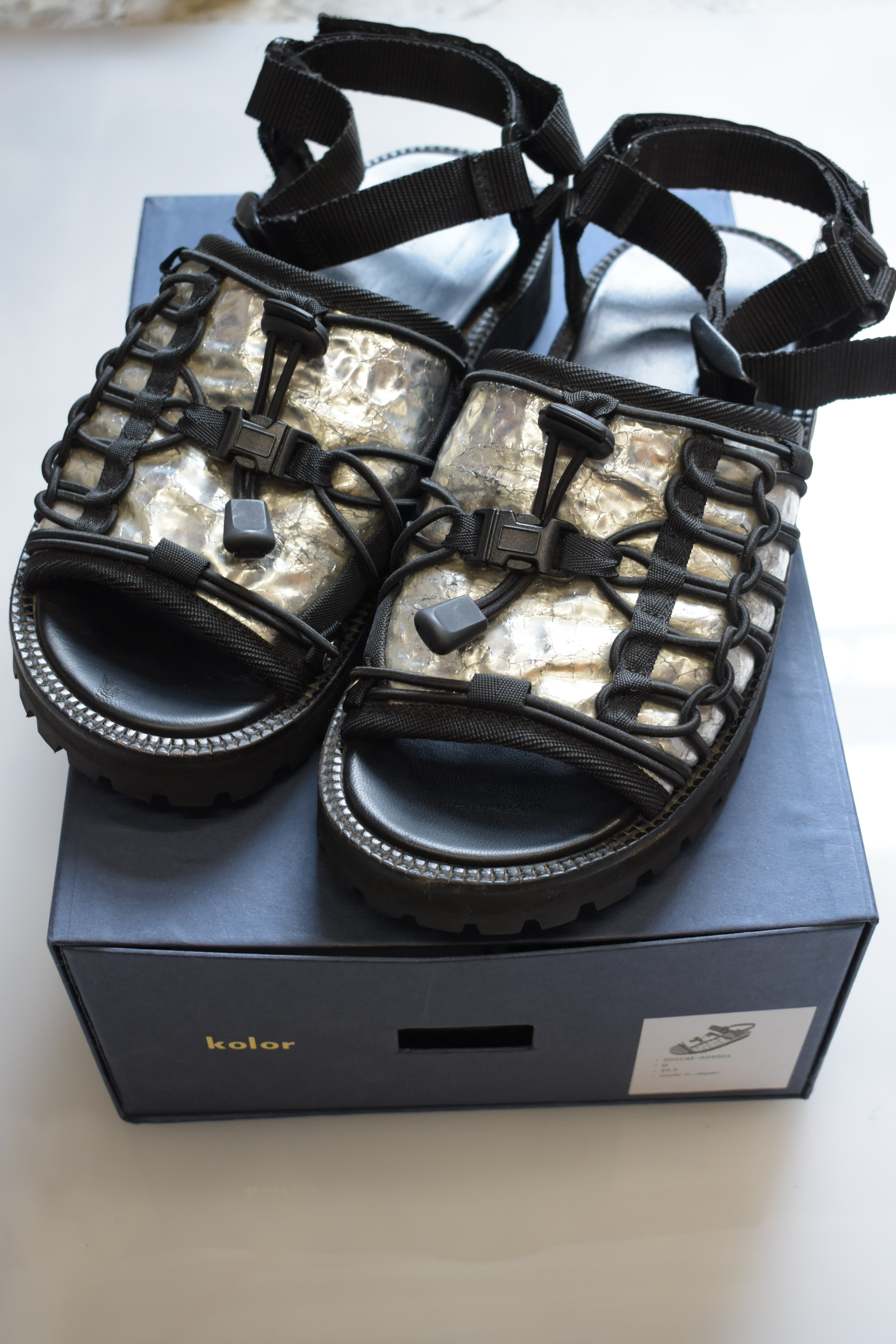 Silver woven black sandals