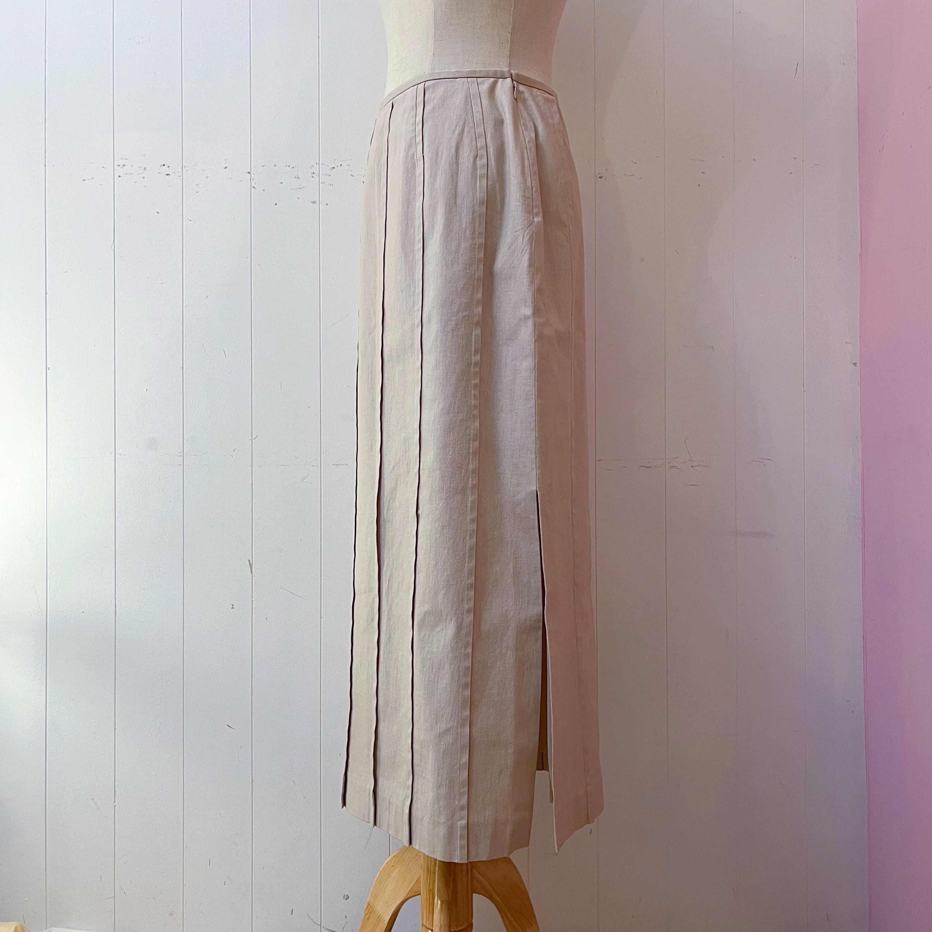beige pleats side slit long skirt