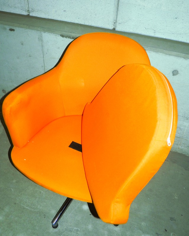 Orange swivel/height-adjustable shell-style personal chair