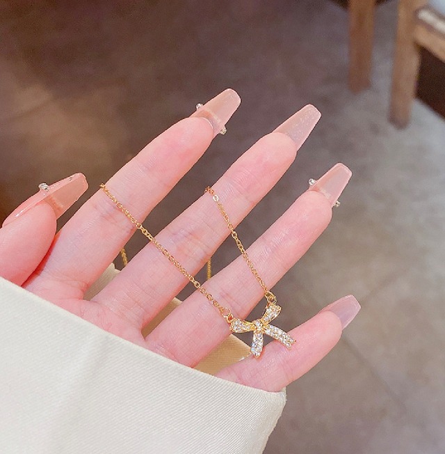 gold ribbon necklace