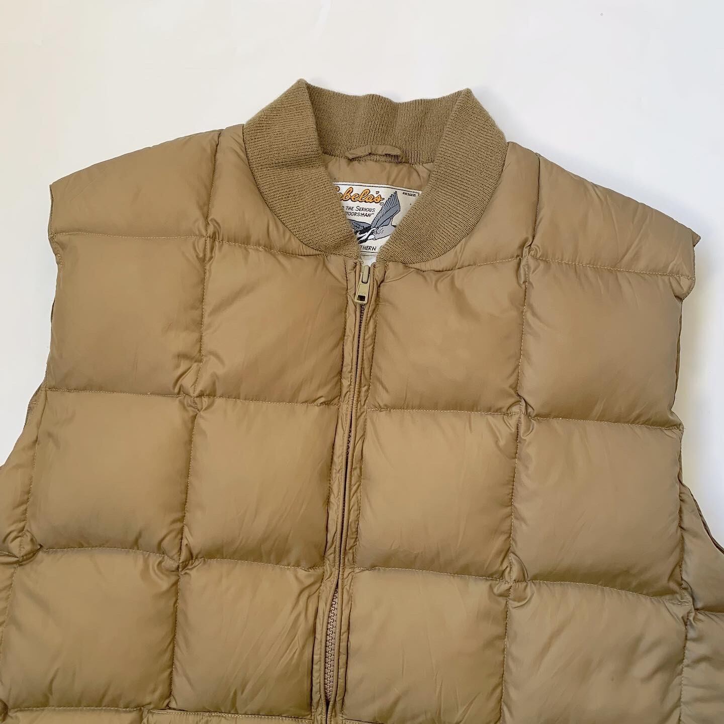 Cabela's down vest ON THE HILL