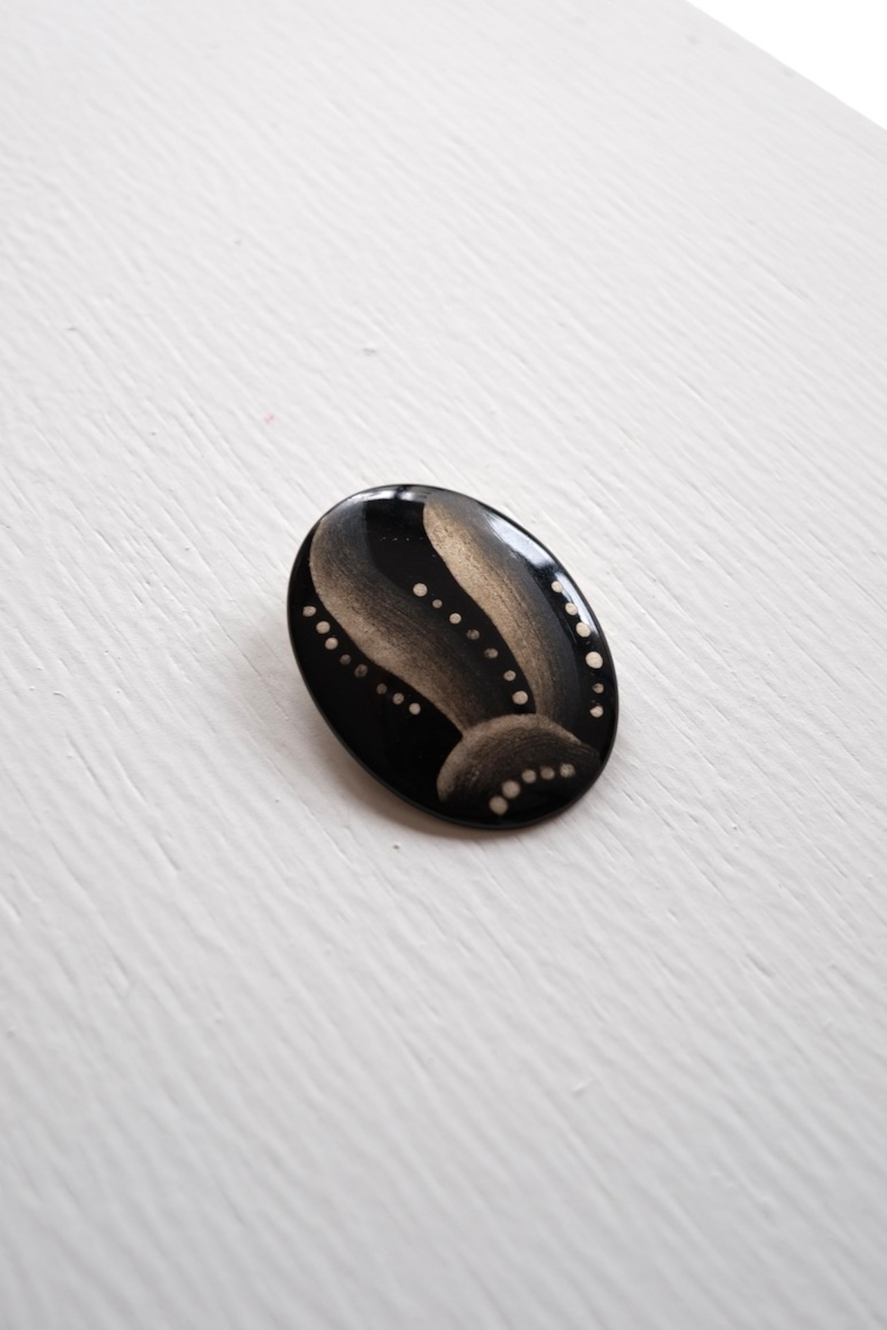 Hand-painted oval brooch