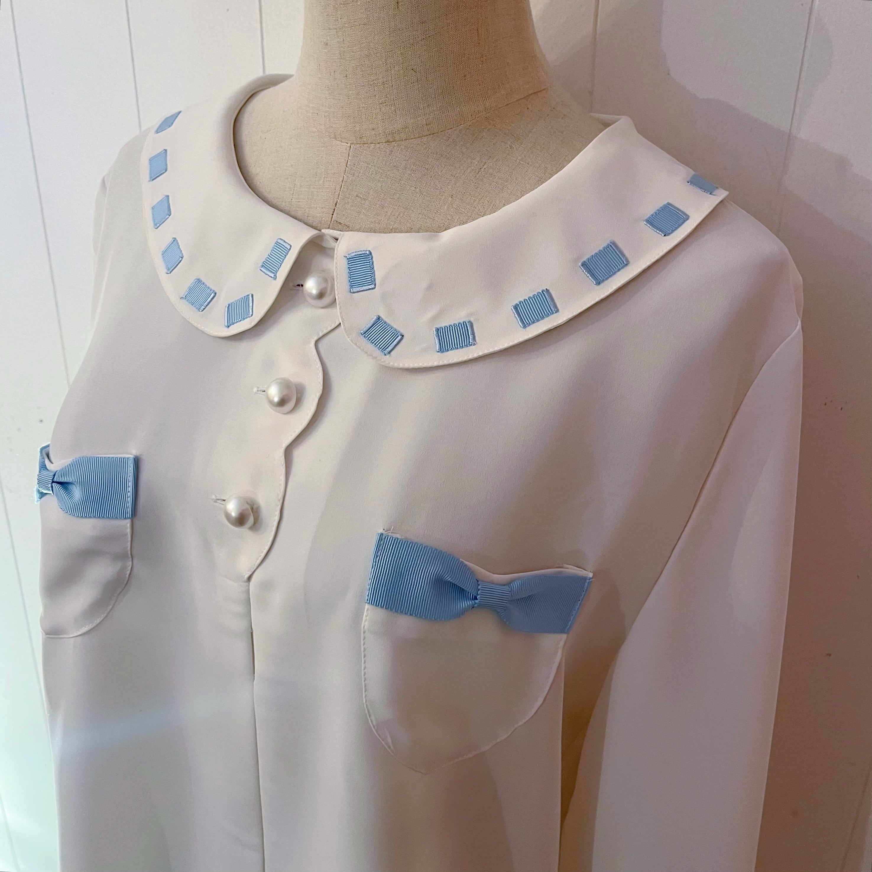 light blue ribbon white blouse