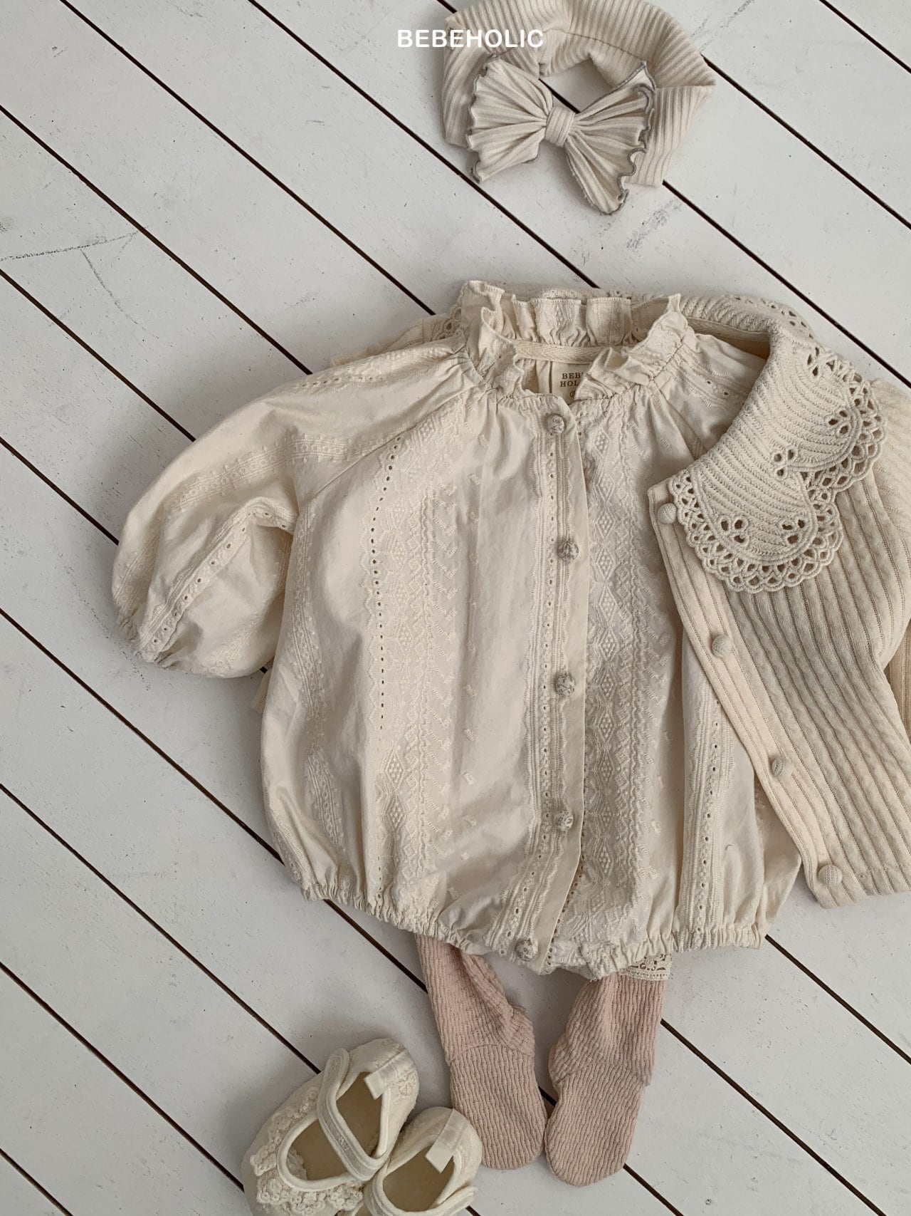 【即納/75.80size】アーミーフリルロンパース / bebeholic
