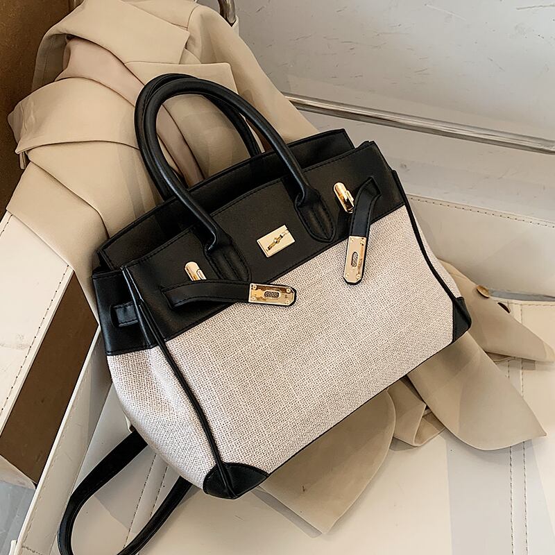 シンプル感と大容量2020新しい流行のファッションワイルドワンショルダーメッセンジャーラージバッグネットレッドポータブルプラチナバッグ Tiancai_Wing_Bag76863351721