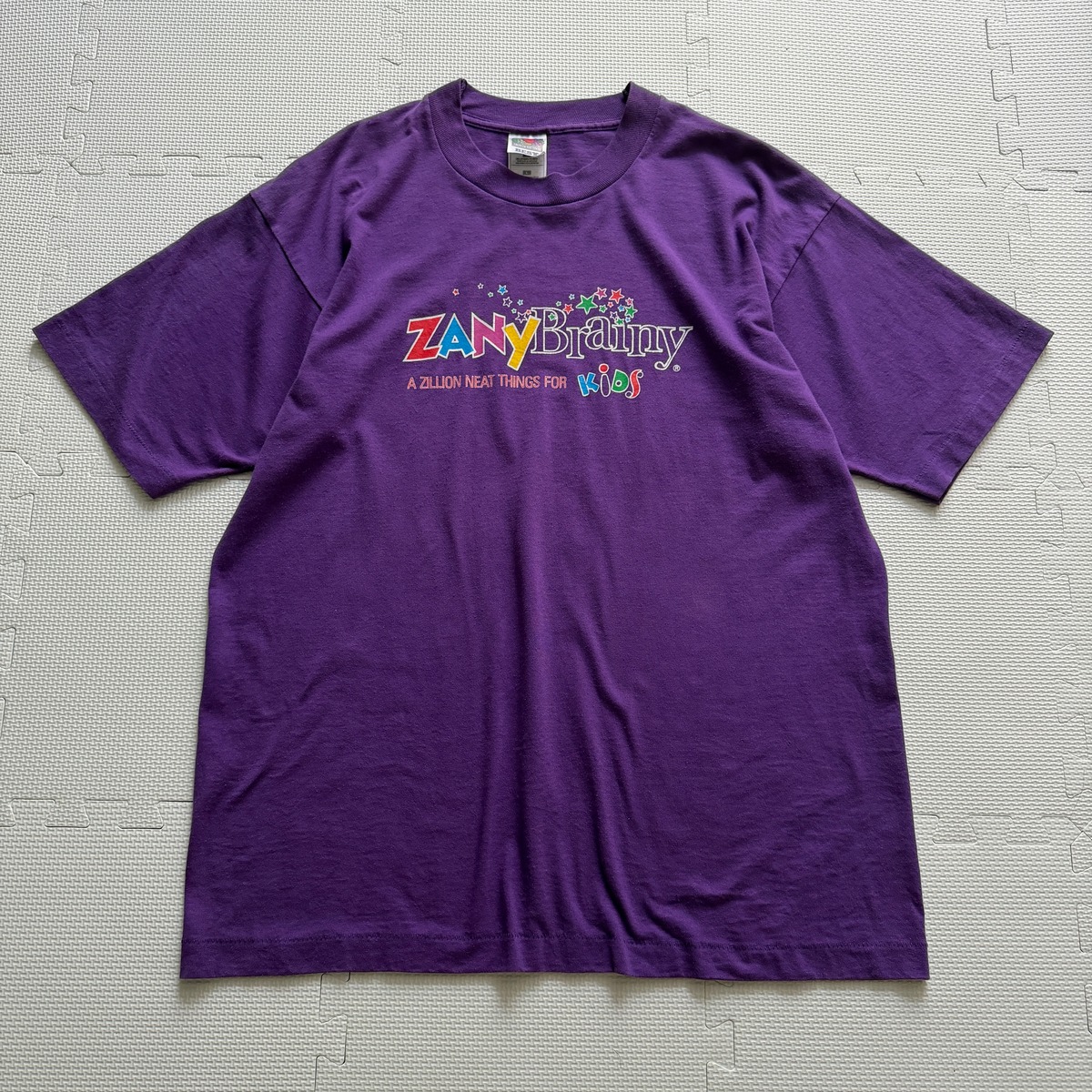 Zany Brainy Reston Zany Brainy”】1990’s “Zany Brainy” S/S novelty tee multicolor print ...