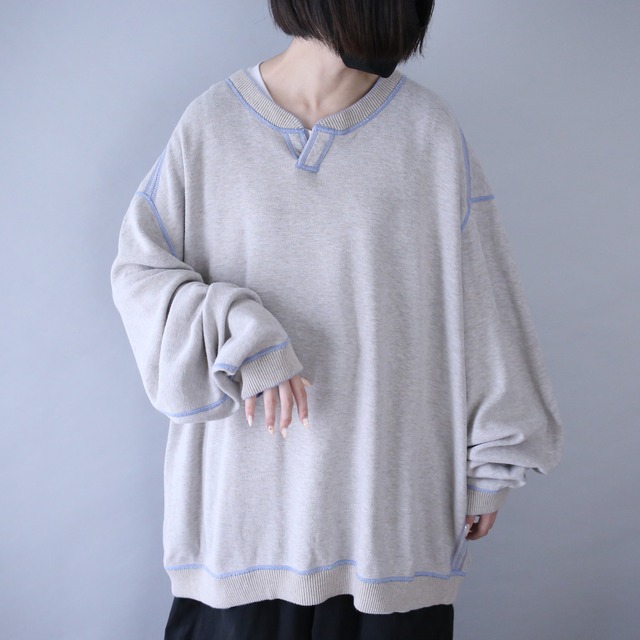 "2-way" stitch work design over silhouette sweat