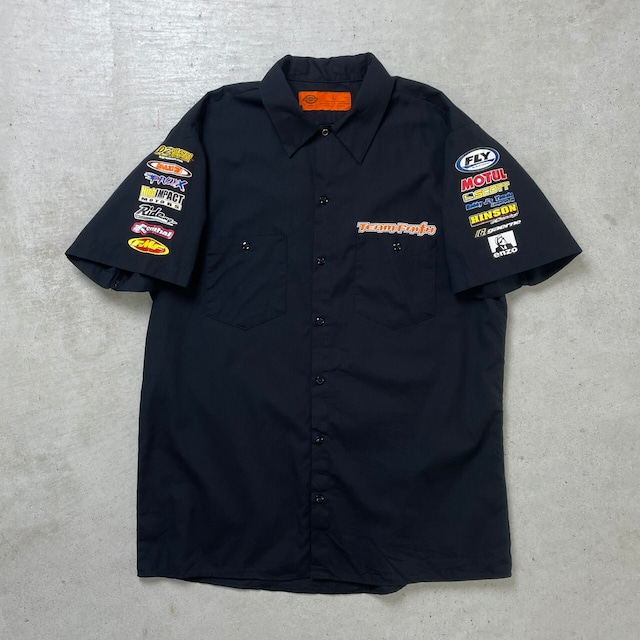 Dickies ディッキーズ 半袖 ワークシャツ TEAM FAITH フリースタイルモトクロス 企業ロゴプリント メンズL-XL相当 古着 袖プリント FMXショー 黒色【半袖シャツ】/ブラック