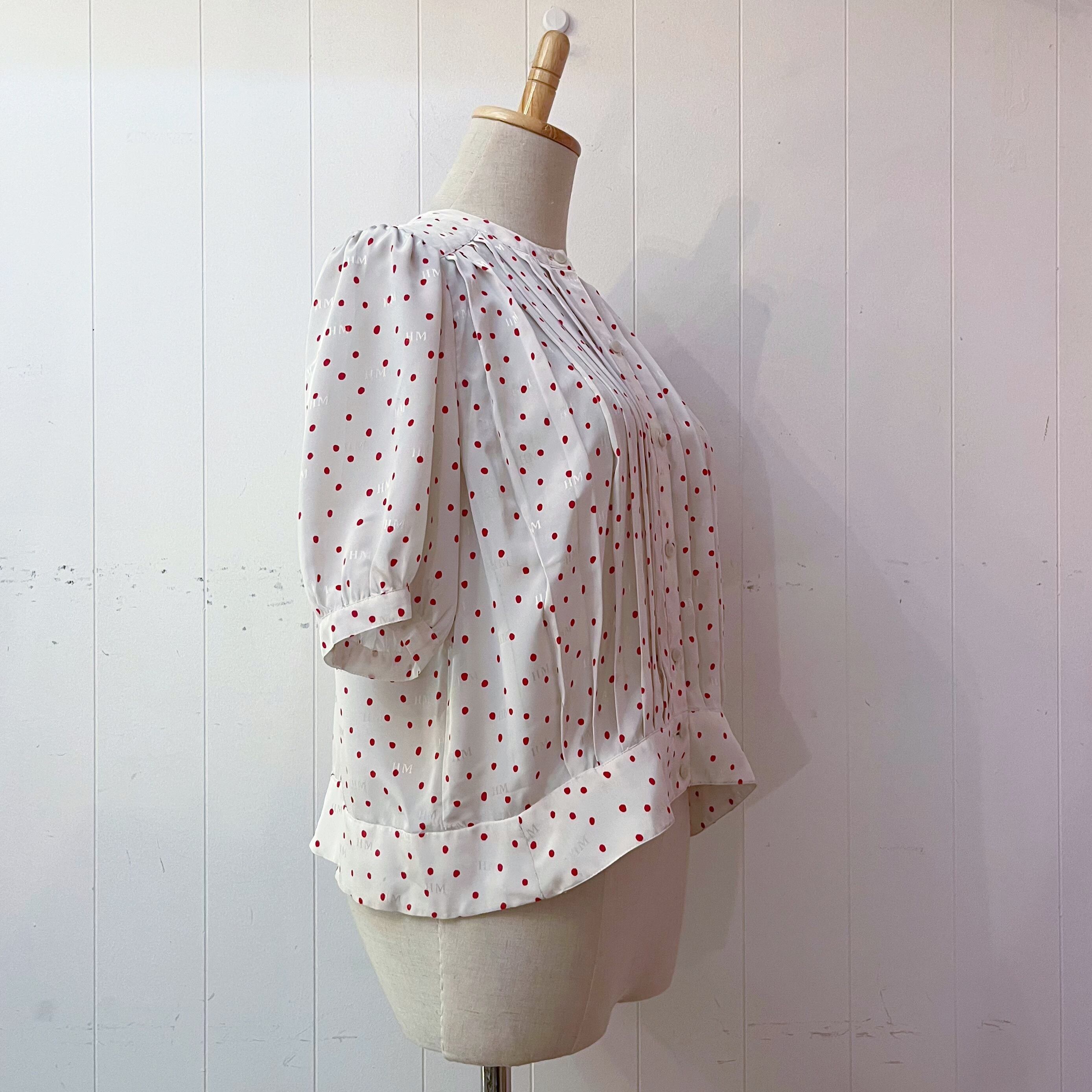 red dot pleats white blouse