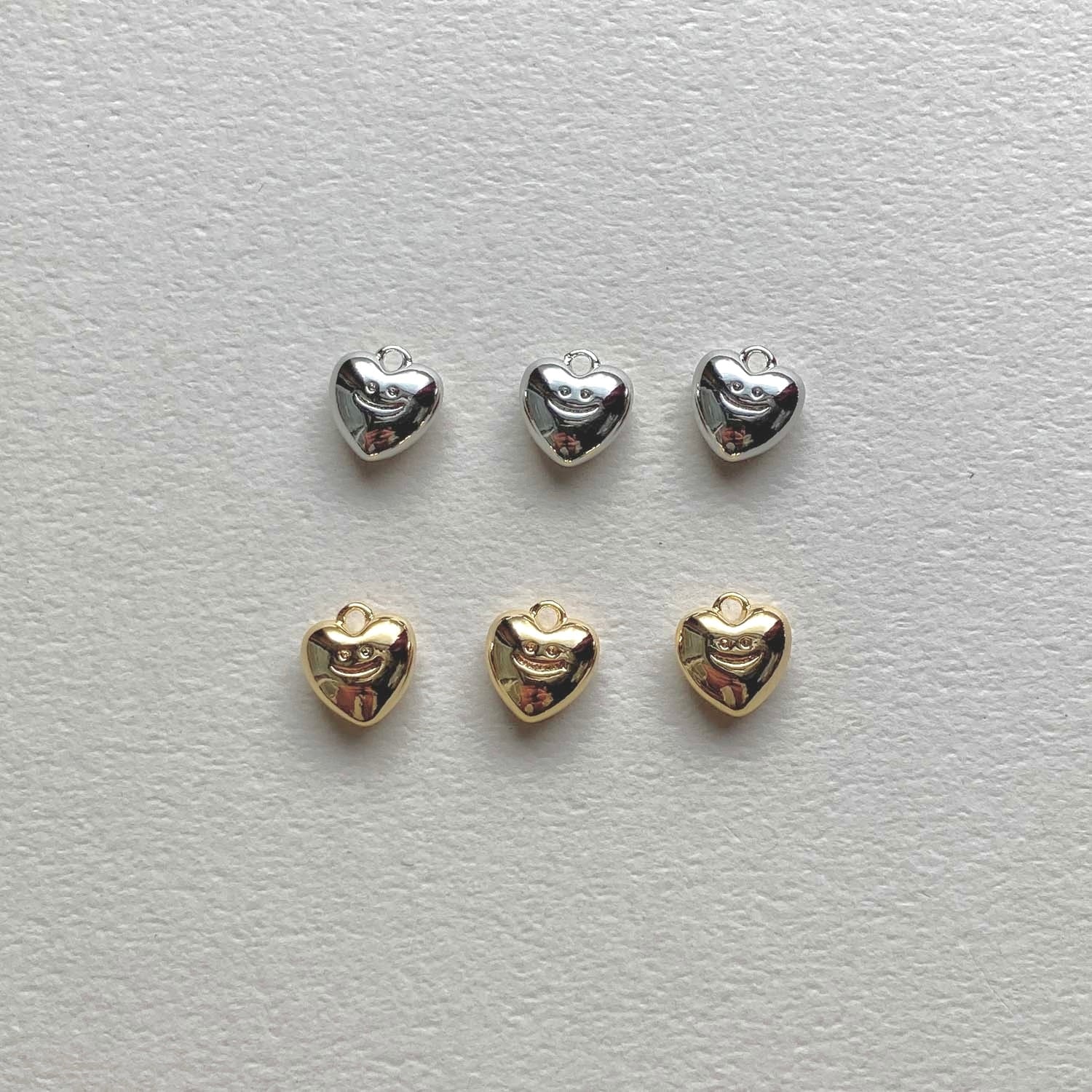 スマイルハートチャーム(16K/プラチナメッキ)