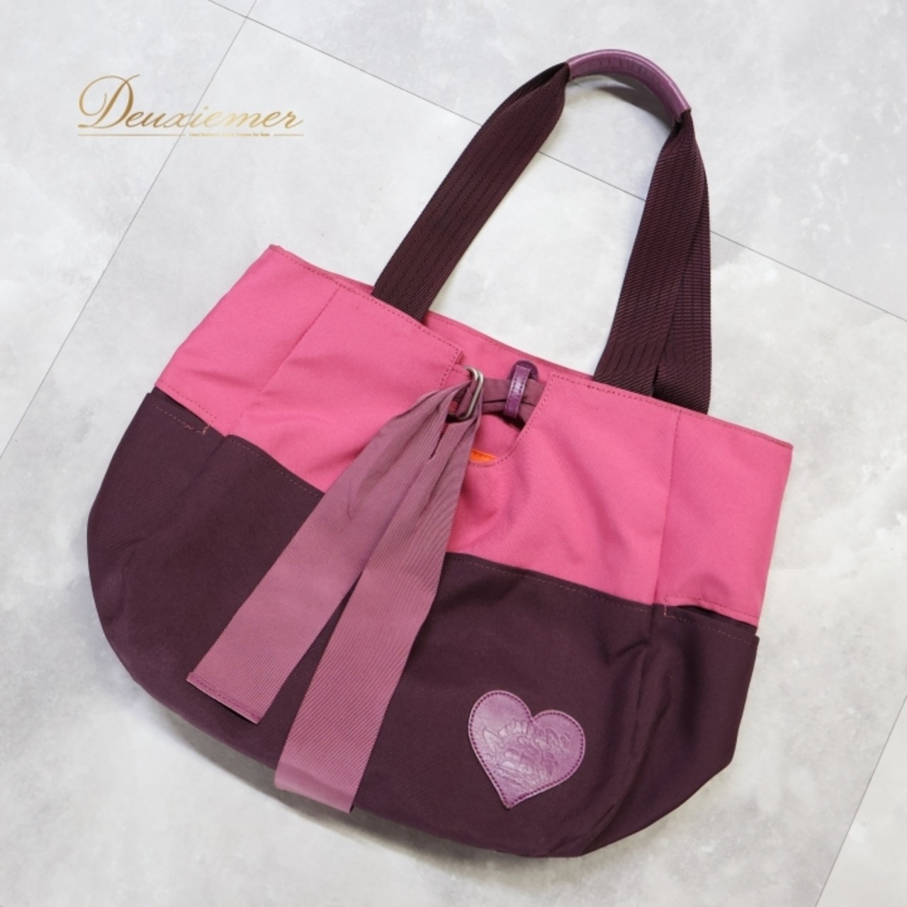 レディース トクコプルミエヴォル TOKUKO 1er VOL バッグ パープル系 トートバッグ 肩掛け 紫 橙 ハート ポケット かわいい カジュアル おしゃれ お出かけ 落ち着いた色 ピンク系 オレンジ系