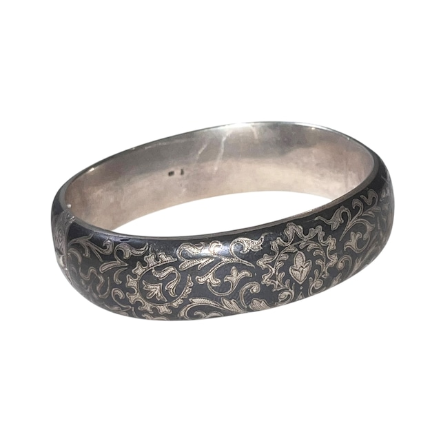 vintage engraved silver bangle with black enamel