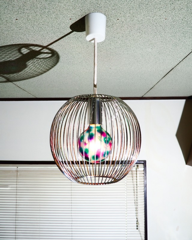 National iron wire pendant light with a psychedelic light bulb