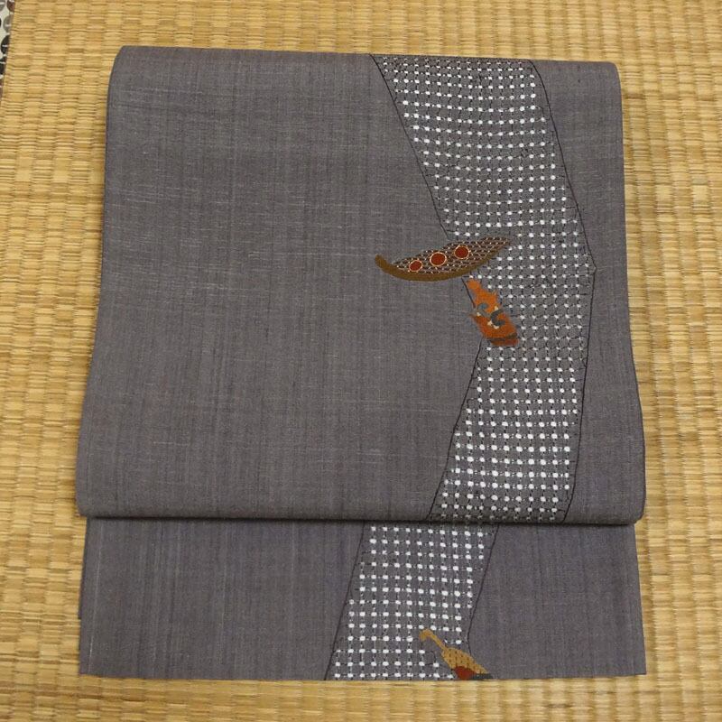 渋めの鳩羽色の紬地にスワトウ刺繍 全通 洒落袋帯 | アンティーク