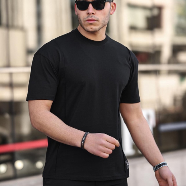 ブラック半袖Tシャツ　ベーシックトップス　オーバーサイズ　ハギデザイン【フランスインポート  TRICT】  F2404054