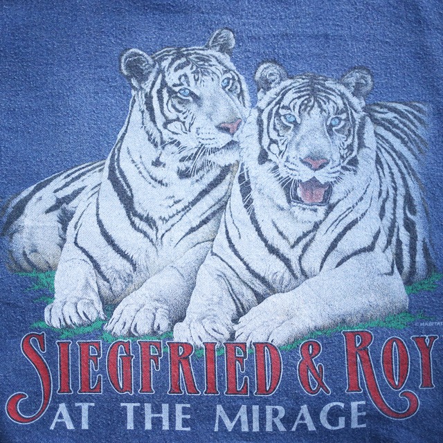 white tiger printed design over silhouette denim pullover