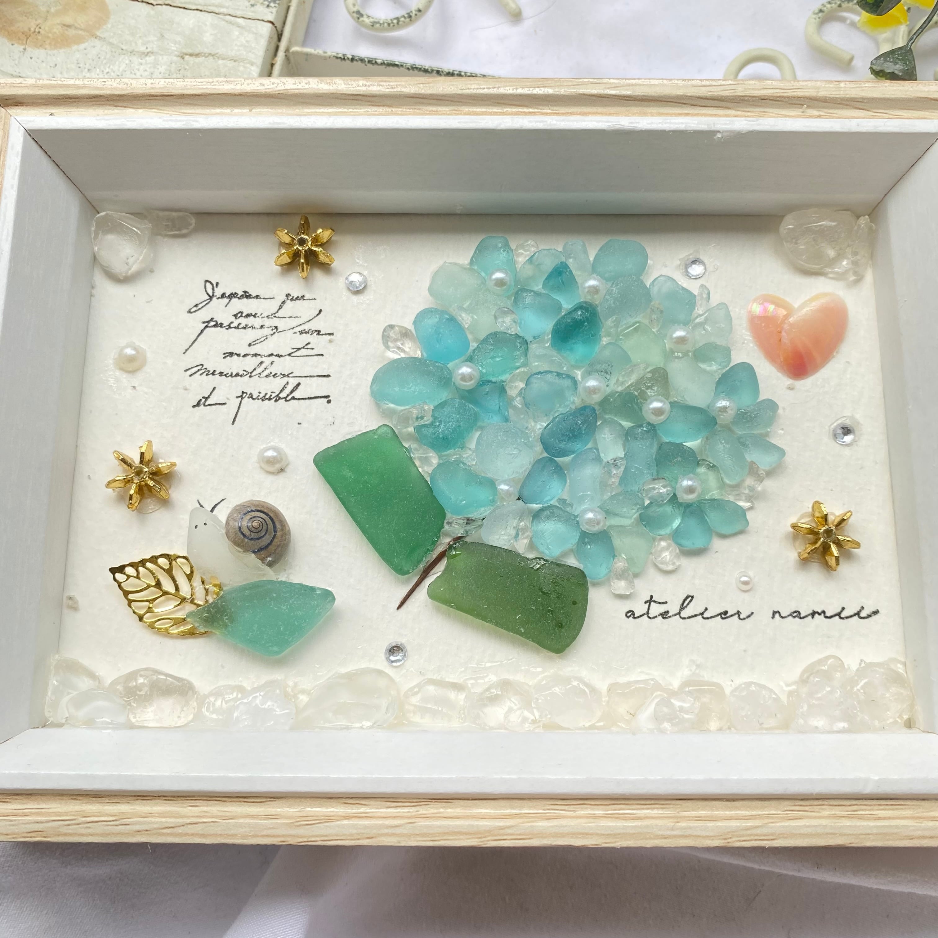 "カタツムリと紫陽花の癒しを"