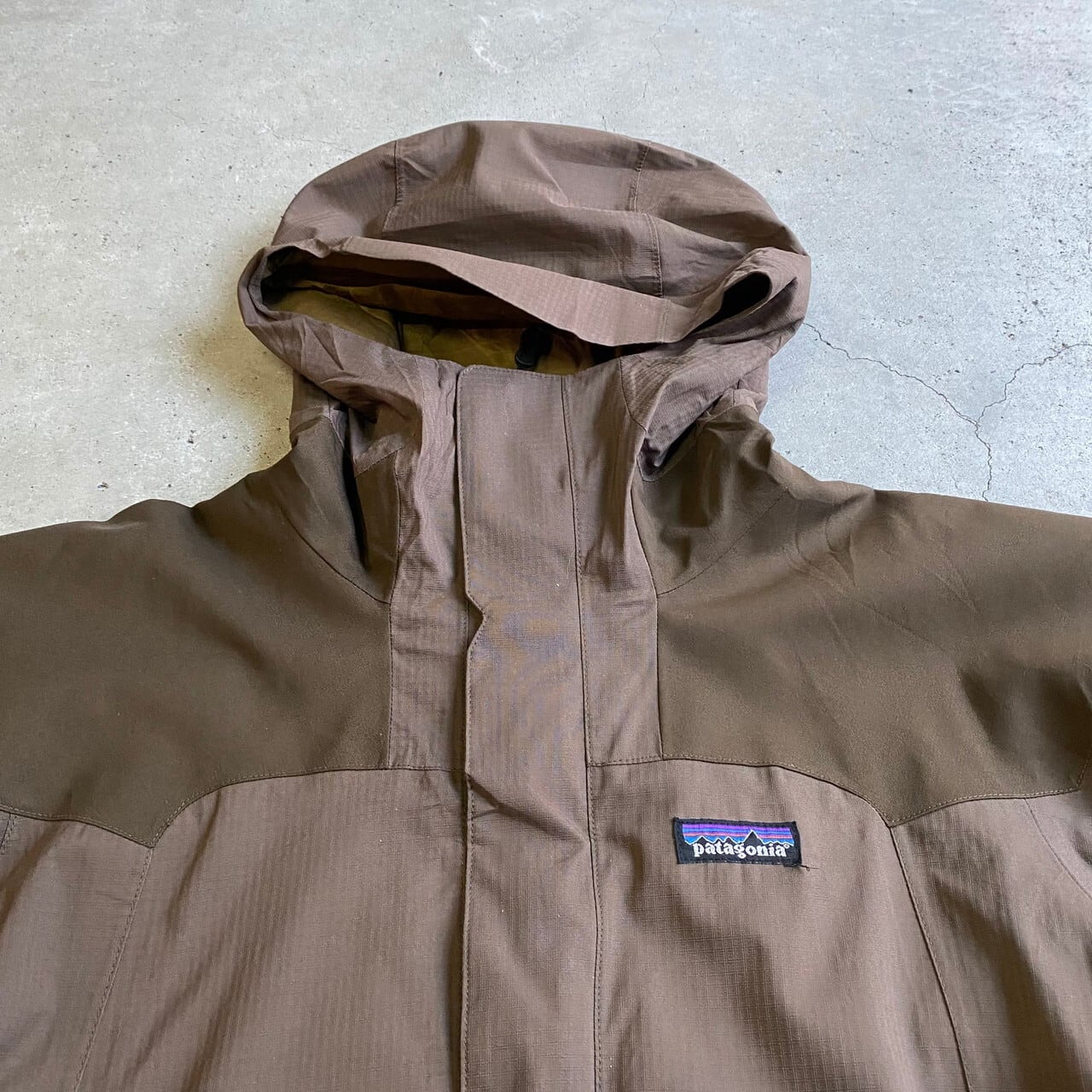 09年製 Patagonia パタゴニア ストームジャケット 84997 メンズS マウンテンパーカー 古着 ブラウン 茶色【アウトドアジャケット】  | cave 古着屋【公式】古着通販サイト powered by BASE