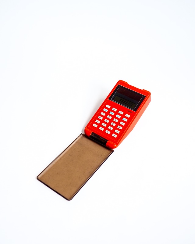 Orange measuring tape & calculator